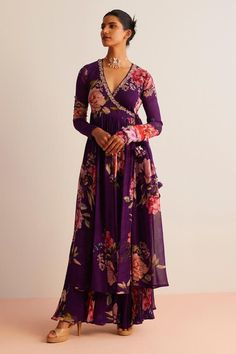 Purple full sleeve angrakha anarkali with floral print and tassel detailing. Paired with a gathered floral print pant.
Components: 2
Pattern: Print
Type Of Work: Floral
Neckline: V Neck
Sleeve Type: Full Sleeves
Fabric: Viscose Georgette
Color: Purple
Other Details: 
Model height:  5 ft 9 inches, wearing size S
Length:
Angrakha Length - 50 inches
Pant Length - 42 inches
Occasion: Sangeet - Aza Fashions Kurti Full Sleeves Design, Angrakha Style Anarkali, Angrakha Anarkali, Designer Anarkali Dresses, Trendy Outfits Indian, Anarkali Dress Pattern, Print Pant, Designer Kurti Patterns, Pant For Women