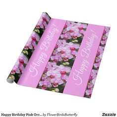 a pink birthday card with flowers on it and the words happy birthday in white lettering