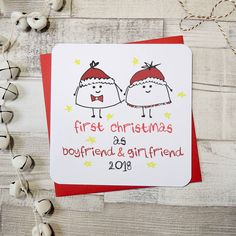 a christmas card with two people wearing santa hats on top of it, and the words first christmas as a boyfriend & girlfriend