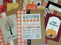 some cards are laying on top of each other with the words autumn and pumpkins