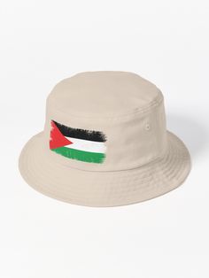 a white hat with the flag of jordan painted on it's brimmed visor