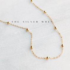 This dainty gold chain necklace, perfect for layering or a minimalist look. •18kt gold plated -lead, nickel & cadmium free•Heavy plating, tarnish resistant, water friendly Dainty Gold Chain, Gold Bead Necklace, Gem Necklace, Personalized Bracelets, Gold Chain Necklace, Dainty Necklace, Gold Beads, Beaded Chain, Ring Necklace