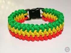 a multicolored bracelet on a white table