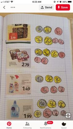 an open notebook with stickers and numbers on it