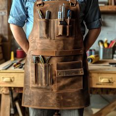 🔨 Meet the Leather Carpenter's Apron: the epitome of craftsmanship and functionality for the modern woodworker! Handcrafted with care and precision, our apron is designed to withstand the rigors of the workshop while exuding timeless style. Craftsman Workshop, Leather Pocket, Leather Workshop Ideas, Leather Projects Ideas, Woodworking Apron, Tool Apron, Tool Roll, Leather Organization, Craft Apron