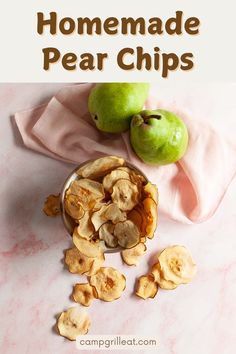 two apples and some pieces of fruit on a pink counter top with text overlay that reads homemade pear chips