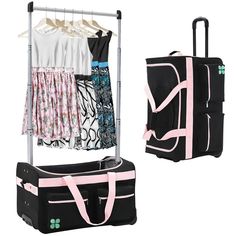 two pieces of luggage are shown with clothes hanging on the rack and another piece of luggage next to it