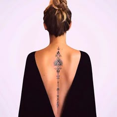 a woman with a tattoo on her back