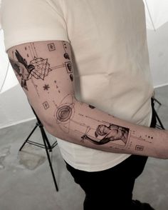 a man with a tattoo on his arm