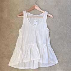 Nwt - Never Worn Simple Cream Colored 100% Cotton Tank. V-Neck Cut And Has Cute Ruffled Hemline Throughout. Front Length Is Slightly Cropped Compared To Backside Hemline. Great To Go Under A Jean Jacket! Chic H&m Tank Top For Summer, Chic H&m Summer Tank Top, Chic Summer H&m Tank Top, H&m Summer Beach Tops, H&m White Spring Tank Top, H&m White Tank Top For Spring, H&m Cotton V-neck Tops, White H&m Tank Top For Spring, H&m Sleeveless Tops For Spring