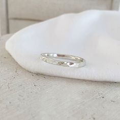 The gorgeous Hammered Fortune ring, this ring is perfect for stacking with other rings or wearing solo.  Crafted by hand with quality sterling silver and hammered texture making each ring unique. Comes gift ready in a beautiful Lush n Luxe Jewellery pouch. Listing is for one ring. Approximately 2mm thick Handmade in my Jewellery studio in Perth, Western Australia.  (colour may vary slightly due to being viewed on a mobile screen/monitor) Any questions get in touch. Be sure to follow along on my socials for more!  www.instagram.com/lush_n_luxe www.facebook.com/lushnluxe www.lushnluxe.com.au   Gemma xo Hammered Silver Ring With Stone, Adjustable Hammered Minimalist Rings, Silver Ring Hammered, Modern Silver Hammered Rings, Minimalist Hammered Silver Stackable Rings, Minimalistic Ring, Silver Hammered Ring, Jewellery Studio, Ring Minimal