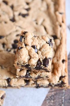 chocolate chip cookie bars stacked on top of each other