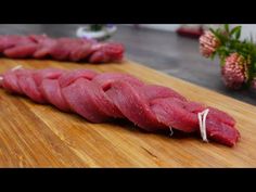 raw tuna on a cutting board ready to be cooked