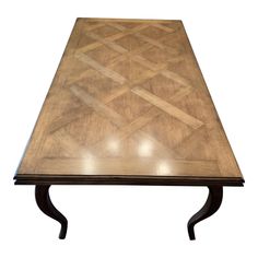 a wooden table with black metal legs and a wood pattern on the top, against a white background