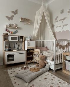 a baby's room with a bed, dresser and crib in it that has a teddy bear on the floor