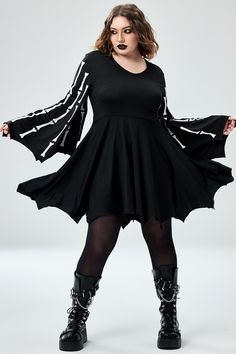 DESIGN INSPIRATION Get into the Halloween spirit with this plus size bat skeleton costume. Not only does it provide exceptional comfort and softness, ensuring your utmost comfort throughout the Halloween event, but it also features a spooky skeleton print that adds a chilling touch to your look while reflecting your unique personality. And the versatility of this costume extends beyond Halloweenit can be worn for daily wear as well. For a stylish modern twist, consider pairing it with stockings and boots. SIZE FIT Model shown is 5'6.9" inch wearing XL/14-16. FABRIC CARE Shall: Knitted Lining: No Cares: Machine Wash DETAILS Type : Mini Dresses Occasion : Halloween Elasticity : High Stretch Neckline : Hooded Sleeve Type : Trumpet Sleeve Sleeve Length : Long Sleeve Color : Black Season : Fall Plus Size Bunny Costume, Halloween Costume Black, Skeleton Dress, Bat Skeleton, Stockings And Boots, Dresses Occasion, Plus Size Halloween Costume, Spooky Skeleton, Witch Dress