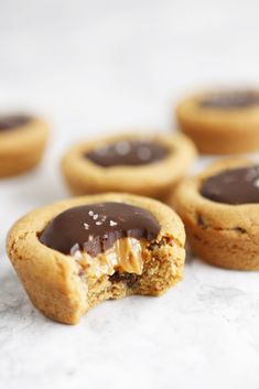 some cookies with chocolate and peanut butter on them