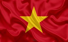 the flag of vietnam is waving in the wind with many folds and waves around it