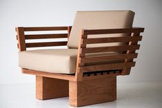 a chair made out of wood and fabric