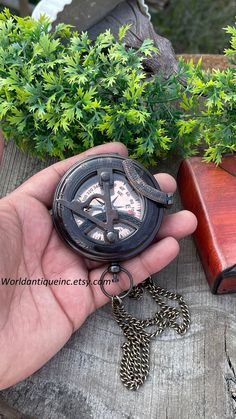 "Welcome To my store A Beautiful Sundial Compass, Perfect Gift for any occasion, Christmas, Birthday, Anniversary, Wedding Gift etc. Personalized engraving on the back makes it more unique and personal. You can have NAME, DATE, QUOTE, GPS COORDINATES, IMAGE or LOGO engraved on the back. Size of the compass is 3\" approximately. Material of compass is brass. Finish : Antique Finish Metal : Brass   Finish : silver F , black , brass Gold , antique  Finish:- Four Finish this compass please choice Required like  1st :-    Brass Golden Finish 2nd :-  Antique Finish 3rd :-   Silver finish 4th :-   Black finish  please choice Case and Wooden box you require like only compass in leather case in anchor wooden box in TRANSPARENT WOODEN BOX IN CROSS WOODEN BOX In Engraved Wood Box  Engraving on the ba Pocket Compass, Brother Gifts, Father Christmas Gifts, Personalized Gifts For Men, The Compass, Gps Coordinates, Son Gift, Camping Gifts, Engraved Wood