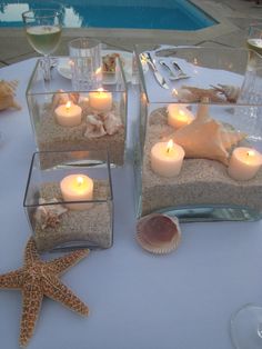 Seashore Table Beach Sand Centerpieces, Wedding Decorations Beach Theme, Wedding Beach Theme Decorations, Coastal Vase Decor, Beach Theme Party Table Decor, Under The Sea Center Piece Ideas, Birthday Beach Theme Decorations, Casual Beach Wedding Reception, Wedding Beach Centerpieces