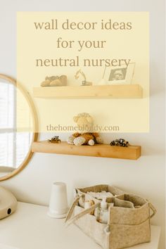 a white desk with a mirror and some items on the shelf above it that says, wall decor ideas for your neutral nursery