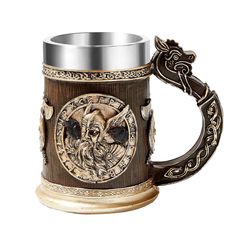 a beer mug with an image of a demon on the front and sides, is shown against a white background