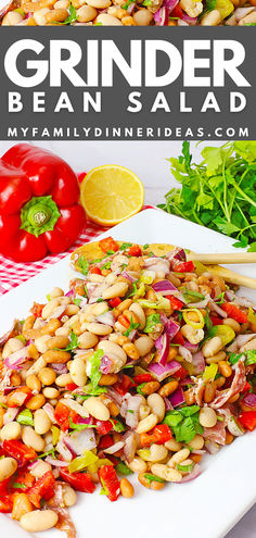 this is an image of a salad made with beans and vegetables on a white platter