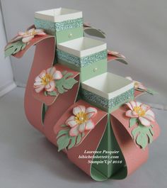 an origami box with flowers on it