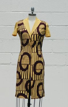 A modern take on classic style using African fabric.  The fabric is 100% cotton and we will create a custom dress with your supplied measurements. Fitted Cotton V-neck Mini Dress, Elegant Formal Cotton Mini Dress, Elegant Cotton Mini Dress For Formal Occasions, Fitted Cotton Mini Dress For Casual Wear, Vintage Fitted V-neck Midi Dress, Cotton Fitted Midi Dresses, Fitted Cotton Midi Dress, Fitted Yellow Dress For Casual Wear, Fitted Midi Cotton Dress