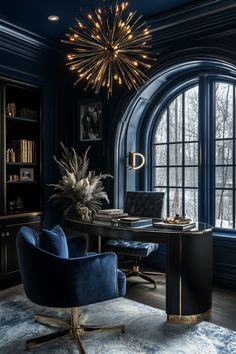 an elegant office with blue walls and large arched windows, gold chandelier above the desk