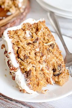 a slice of carrot cake on a white plate