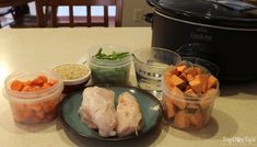 the meal is ready to be eaten on the kitchen counter with crock pot in the background