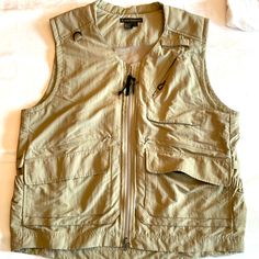 Multiple Pockets, Quick Dry Men’s Travel Or Fishing Vest, Safari, Etc. Never Worn. Functional Fishing Outerwear With Pockets, Sleeveless Hunting Vest Outerwear, Fly Fishing Vest, Hiking Vest, Military Style Vest For Hiking, Safari Vest, Tan Vest, Travel Vest, Outdoor Vest