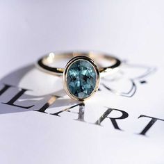 clio-https://clio.giliarto.com/ring/1/507 Oval Moissanite Ring, Yellow Gold Engagement Ring, Bezel Engagement Ring, Teal Sapphire, Oval Moissanite, Yellow Gold Engagement, Yellow Gold Engagement Rings, Engagement Rings Oval, Gold Engagement Ring