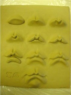 an assortment of fake eyes on a plastic sheet