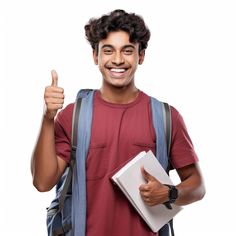 a man with a backpack giving the thumbs up sign and holding a book in his hand