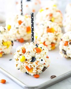 halloween candy popcorn balls on a tray