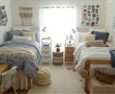 a bedroom with two twin beds and pictures on the wall above them, along with other furniture