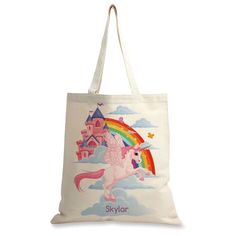 a white tote bag with a pink unicorn and rainbow on the front that says skylar