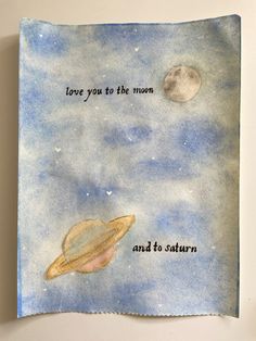 a piece of paper with the words love you to the moon and to saturn