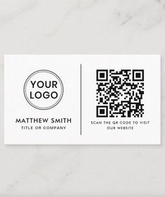 a white business card with a qr code on the front and black print on the back