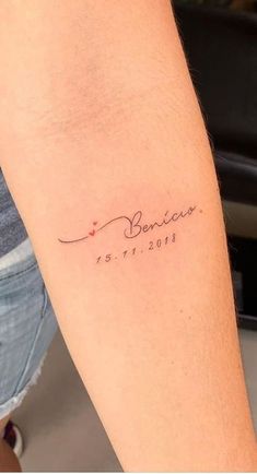 a woman's arm with a tattoo that reads, benicee and is in cursive writing