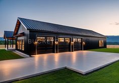 a black garage with two doors and windows