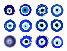 six different blue and white circles with black dots on them, each one has an eyeball