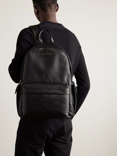 Brunello Cucinelli's backpack has been made in Italy from full-grain leather, fitted with adjustable shoulder straps and has a capacious interior designed to hold your tablet, sneakers and latest read. It's detailed with front and side pockets so your travel pass and mobile phone are always in easy reach. Backpack Leather Man, Office Backpack For Men, Leather Backpack Outfit, Leather Garment Bag, Mens Designer Bag, Elegant Backpacks, Office Backpack, Leather Wash Bag, Leather Backpack For Men