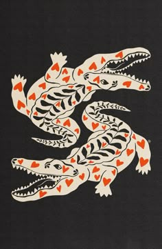 an orange and white alligator with hearts on it's back