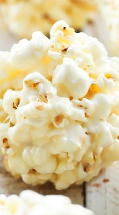 white popcorn balls are sitting on a table