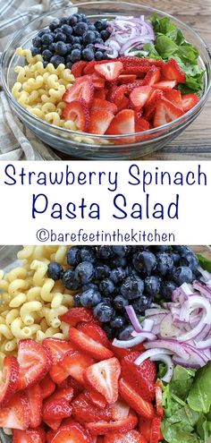 strawberry spinach pasta salad with blueberries and red onions in a glass bowl on a wooden table