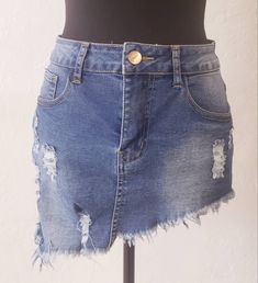 Distressed denim jean skirt. Pocks, zipper, and button. Women's skirt can be paired with anything.. sizes small, medium, and large. Ripped High Waist Medium Wash Mini Skirt, Ripped High Waist Denim Skirt, Ripped High Waist Mini Skirt In Medium Wash, Ripped High-waist Mini Skirt In Medium Wash, High Waist Ripped Mini Skirt In Medium Wash, High Waist Ripped Denim Skirt, Ripped Medium Wash Denim Skirt, Ripped Denim Skirt In Medium Wash, Mid-rise Ripped Denim Skirt